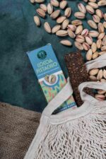 cereal-bar-on-a-table-with-raw-pistachios